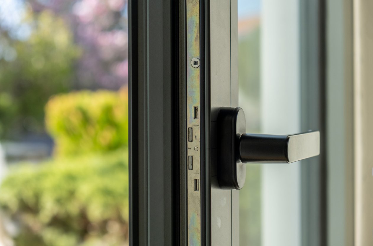 Aluminum window open detail. Metal door frame closeup view.